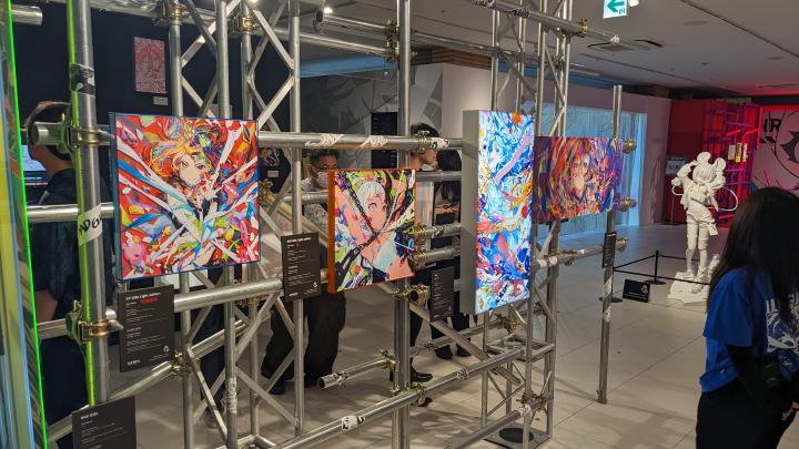 Art installation built from metal pipes with Mika's arts attached to it